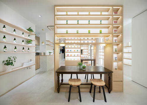 Neutral colour palette and product display feature in the interior of Beauty Library by Nendo