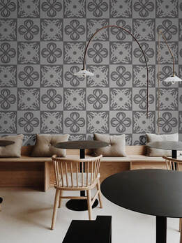 Rokusho ROKLDGY patterned wallpaper in alternating shades of light grey and dark grey in a coffee shop interior