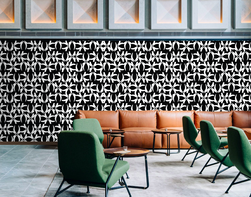 Black and white fragmented geometric wallpaper on a wall in the interior of a hotel lobby