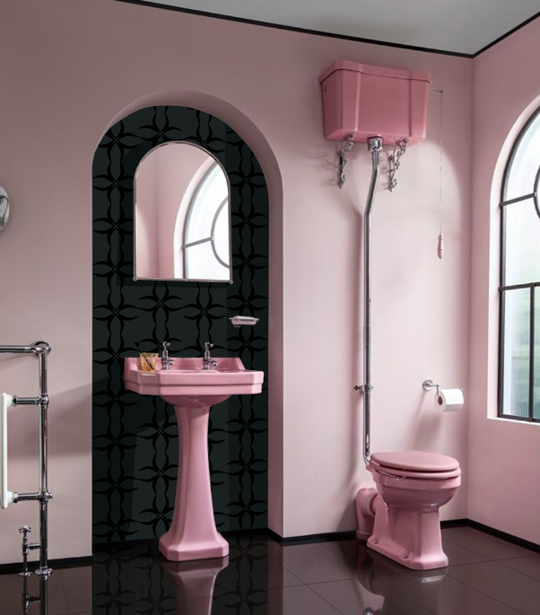 Black geometric wallpaper on an arched recessed wall in a pink bathroom