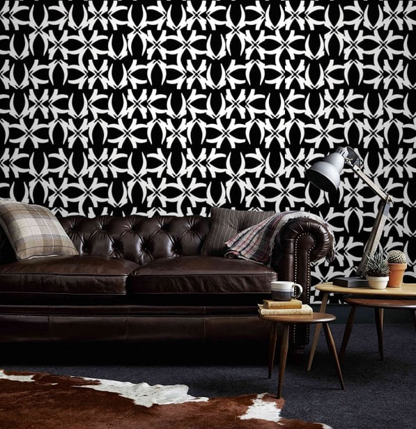 173NASH Icon black white patterned wallpaper behind brown leather couch on wall in an interior