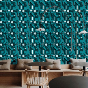 BLOK Mountain Lake shades of blue and teal patterned wallpaper in a coffee shop interior