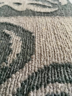 The texture of the low loop construction of the Rokusho ROKLDGY luxury designer rug