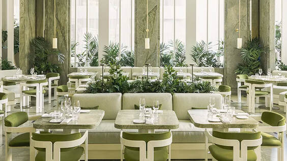 The use of green colours throughout the decor and with plants is used to portray health and wellbeing in a restaurant interior design