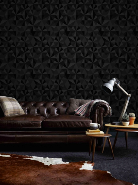 Various shades of black patterned wallpaper on a wall in the interior of a boutique hotel
