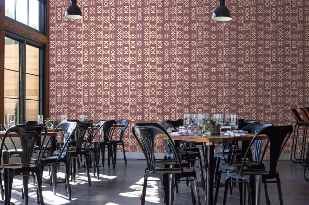 Glyph commercial designer wallpaper on a wall in an industrial styled restaurant interior
