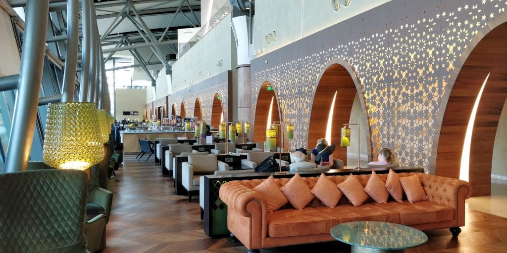 Primeclass lounge interior patterned walls comfortable seating Muscat International Airport