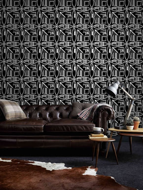 BLOK Comic Noir black and white graphical patterned contemporary wallpaper on a wall in an interior