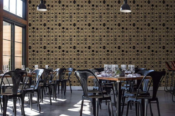 Kingdom Ash patterned commercial designer wallpaper on a wall in a restaurant interior