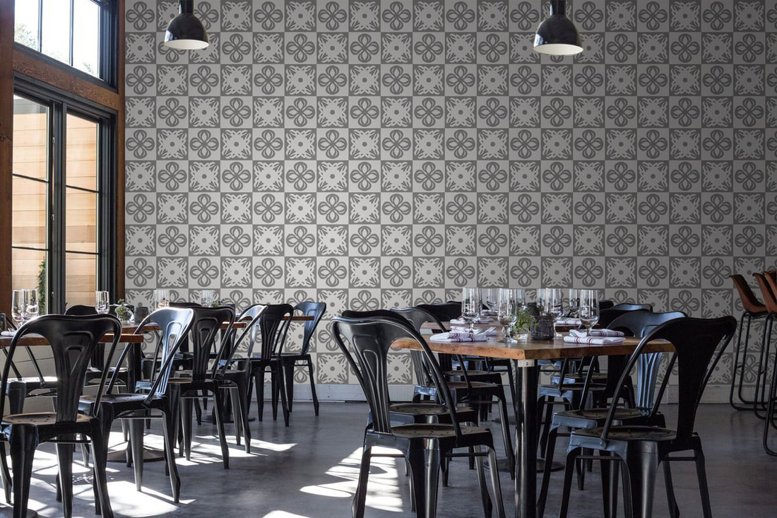 Rokusho ROKLDGY patterned wallpaper in alternating shades of grey on a wall in a restaurant interior