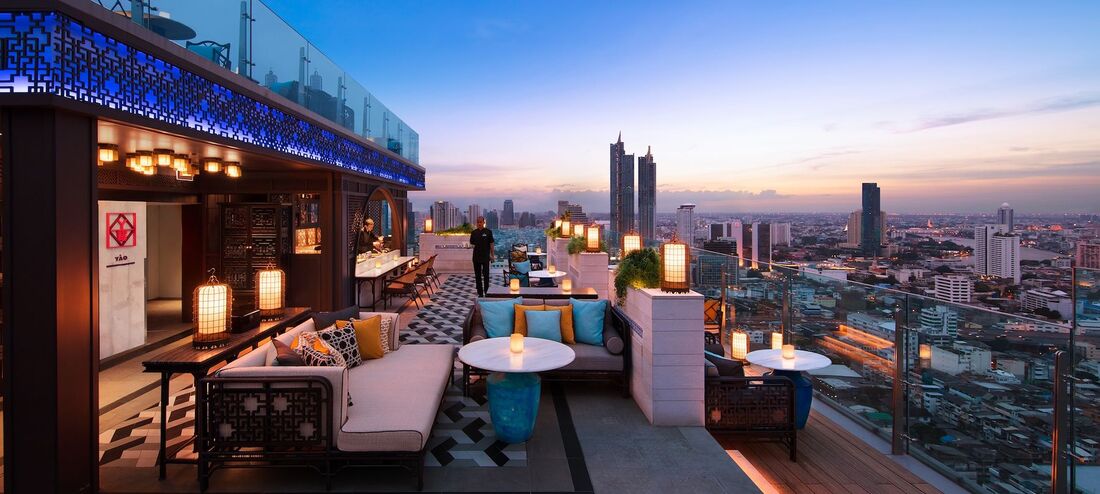Yao rooftop bar design with city skyline in the background